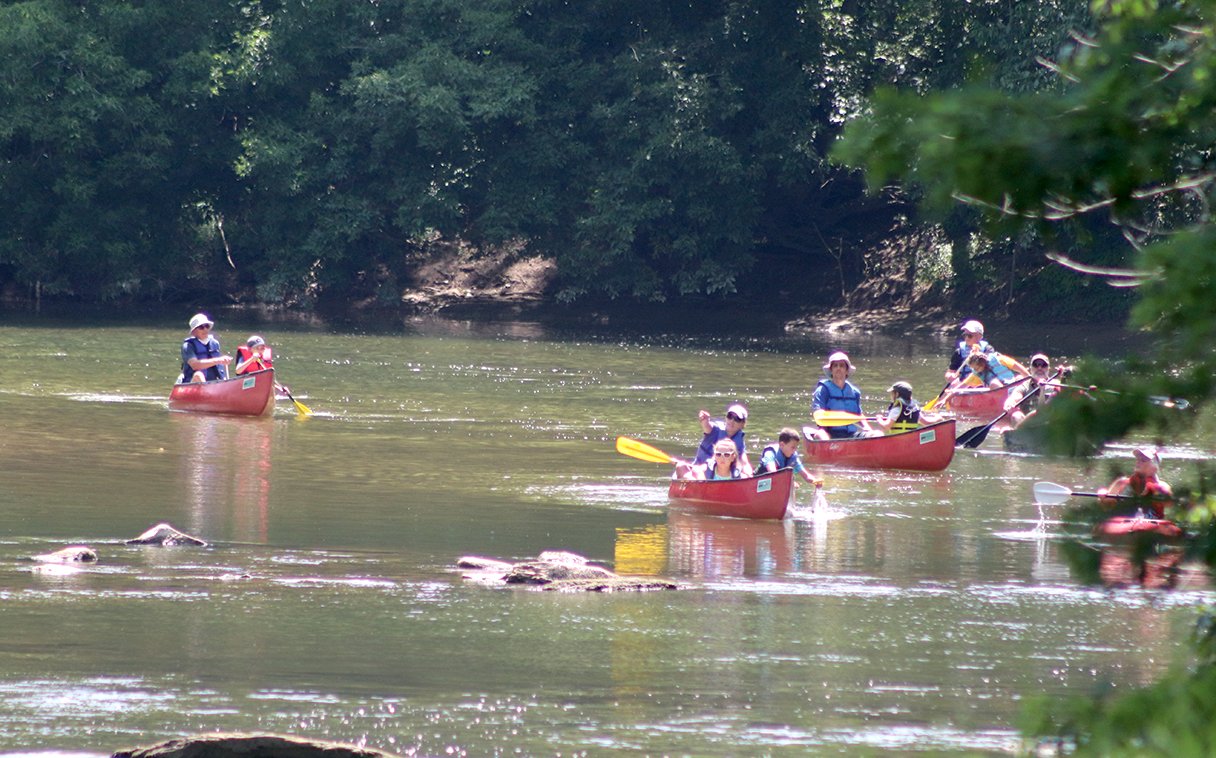 Taking part in the Friend of Sugar Creek “Kids Canoes and Crinoids” canoe trip down Sugar Creek on Saturday, several participants and their leaders make the final push toward Rock River Ridge Trailhead after stopping along the way to observe fossils and learn about nature.